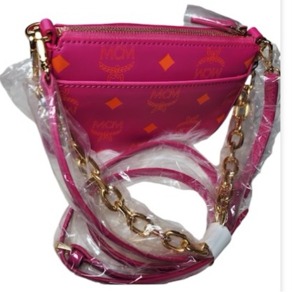 MCM Handbags - NWT MCM Pouchette